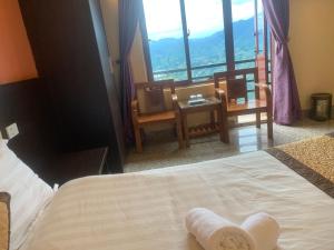Postel nebo postele na pokoji v ubytování Spring hotel