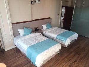 Letto o letti in una camera di Meizhou Cloudy B&B