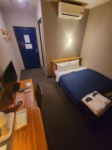 Postel nebo postele na pokoji v ubytování Hotel Seagull