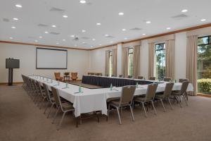 a large conference room with a long table and chairs at Yarra Valley Lodge in Wonga Park