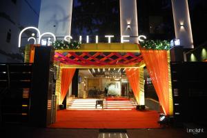a stage with an orange and red at Belvedere Suites in Greater Noida