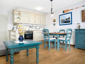 Η κουζίνα ή μικρή κουζίνα στο Residenz am Yachthafen Möwenblick +22 φωτογραφίες