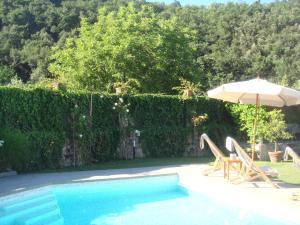 The swimming pool at or close to B&B Pieve Degli Artisti