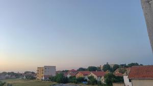 a view of a city with houses and buildings at Privatna soba Marijana-Olja in Surčin