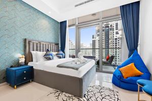 a bedroom with a bed and a large window at FULL Burj Khalifa view LUX 2Bedroom with Rooftop Pool Central location in Paramount Hotel Midtown in Dubai