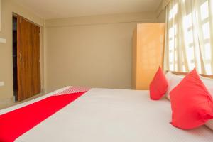 Krevet ili kreveti u jedinici u objektu OYO Hotel Noryang