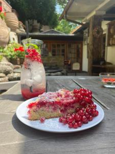 a piece of cake on a plate on a table at Romantik Hotel U Raka in Prague