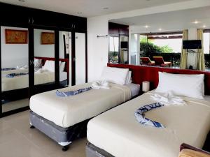Postel nebo postele na pokoji v ubytování Bohol Vantage Resort + 37 fotografií