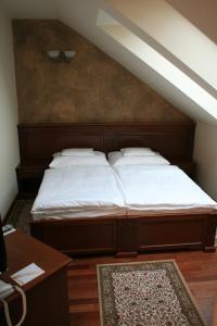Cama o camas de una habitación en Nimród Bioszálloda és Bioétterem