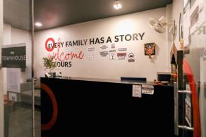 a store with a sign that says baby family has a story advertising ours at Townhouse Ranipur Mor in Haridwār