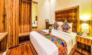 Postel nebo postele na pokoji v ubytování FabHotel Ascot International II - Nr Mumbai International Airport