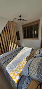 Posteľ alebo postele v izbe v ubytovaní Le Cocon du Rimbach