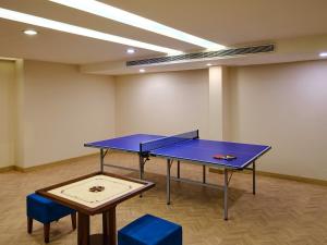 Stolní tenis v ubytování Daiwik Hotels Rameswaram nebo okolí