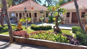 Zahrada ubytování Grand Melka Hotel