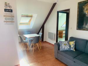 Et opholdsområde på Appartement situé prés des plages et du golf