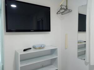 A television and/or entertainment centre at Finca Azahar Chipiona