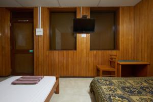 Μια τηλεόραση ή/και κέντρο ψυχαγωγίας στο Ros Heritage Motel