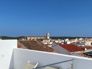a view of a city from the roof of a building at Casa S’Arraval in Mahón