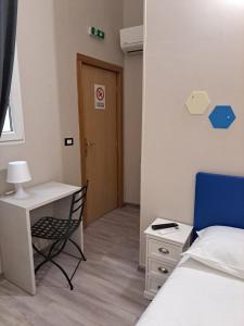 Postel nebo postele na pokoji v ubytování Leonum