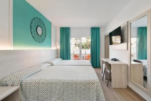 Posteľ alebo postele v izbe v ubytovaní Hotel Best Lloret Splash