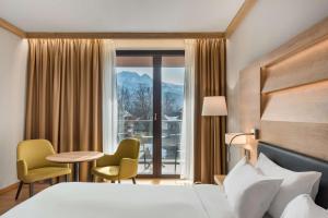Postel nebo postele na pokoji v ubytování Radisson Blu Hotel & Residences