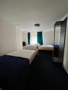 Postel nebo postele na pokoji v ubytování 7Rooms