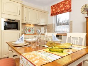 Kuchyň nebo kuchyňský kout v ubytování Landhaus Residenz Kirchsee Strandidyll + 17 fotografií