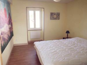Postel nebo postele na pokoji v ubytování Petit gîte ou chambre d'hôtes 2/4 personnes