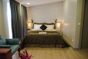 En eller flere senge i et værelse på Star of İstanbul Residence
