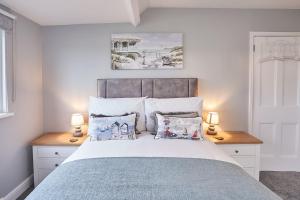 Ένα ή περισσότερα κρεβάτια σε δωμάτιο στο Sandy Steps, Perranporth