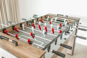 a game of billiards with red balls at Montville Resort Style Holiday Retreat with pool in Perwillowen