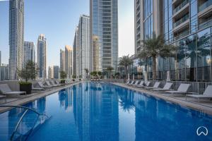 Bazén v ubytování Oraya - Beautiful Apartment With Partial Canal & City View nebo v jeho okolí