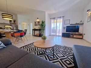 Μια τηλεόραση ή/και κέντρο ψυχαγωγίας στο House Vertel