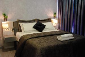 A bed or beds in a room at Star of İstanbul Residence