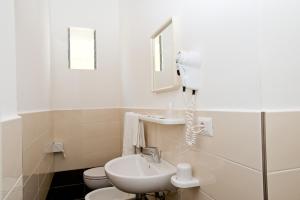 Koupelna v ubytování Albergo Villa Mauri