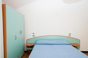 Postel nebo postele na pokoji v ubytování Albergo Villa Mauri
