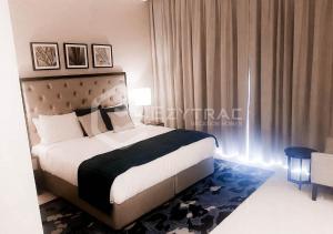 Кровать или кровати в номере Elegant Studio at Damac Celestia, Dubai south - Ezytrac vacation Homes