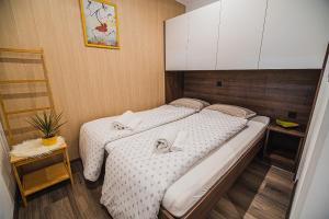 Postel nebo postele na pokoji v ubytování Studio Mobile Home Gotar