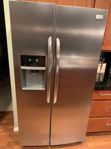 a stainless steel refrigerator with an icebox in a kitchen at Forest & City Views - Near Portland, Nike & Intel in Beaverton