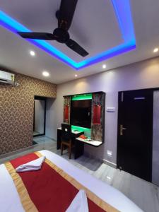 TV a/nebo společenská místnost v ubytování Hotel Swagat