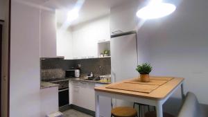 Kuchnia lub aneks kuchenny w obiekcie Precioso apartamento en ares