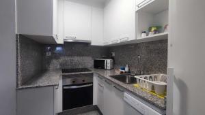 Kuchnia lub aneks kuchenny w obiekcie Precioso apartamento en ares
