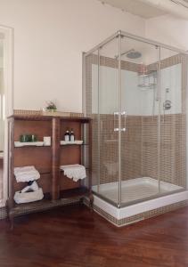 a shower with a glass enclosure in a bathroom at B&B Arianna in Ravenna