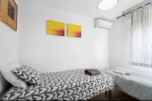 Posteľ alebo postele v izbe v ubytovaní La casa de la playa