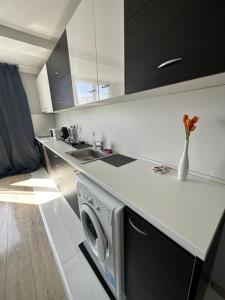 A kitchen or kitchenette at Rose's apartment , self check-in, close to metro