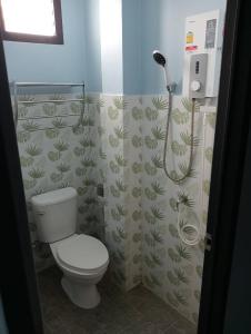 Koupelna v ubytování บ้านฮิมฝั่งแกนแฟมิลี่ + 19 fotografií