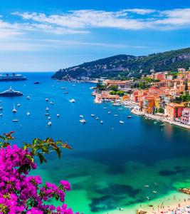 a view of a harbor with boats in the water at Voilier Love Menton in Menton