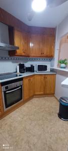 Kuchyňa alebo kuchynka v ubytovaní PMT17 - Penthouse apartment with pool and close to beach
