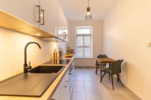 Kuchyň nebo kuchyňský kout v ubytování *Modern* 2 Personen, WLAN