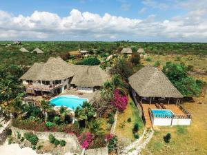 an aerial view of a resort with a swimming pool at Zi Villa Garden Room 1 in Matemwe